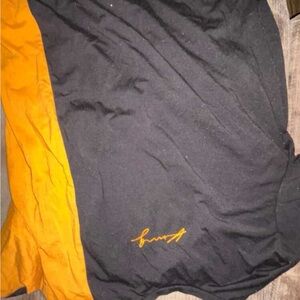 A yellow and black t-shirt